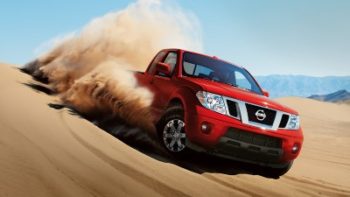 2017-nissan-frontier-lava-red-driving-in-sand-original-custom